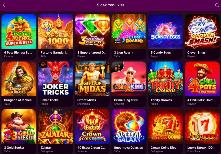 Slot cards in the Casino Luks lobby lined up side by side with artwork from several providers